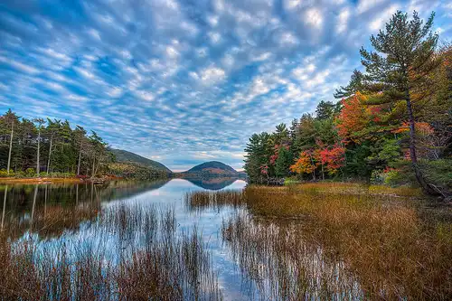 Fall foliage at Eagle Lake in Acadia National Park, Maine.