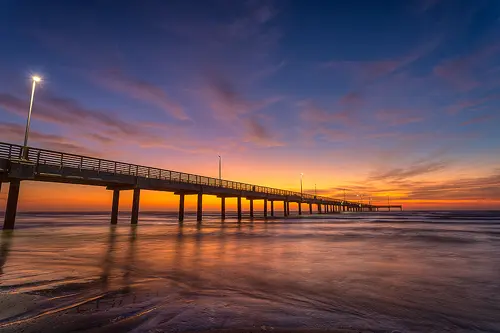 Sunrise photo of the Horace Caldwell Pier, Port Aransas, Texas.