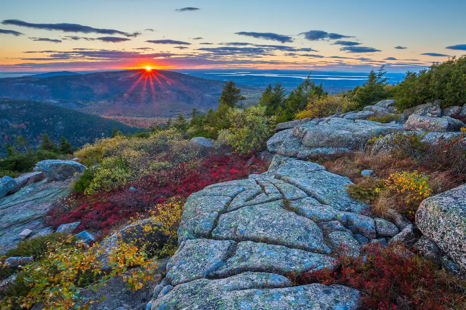 Sunset from Cadillac Mountain in Acadia National Park with fall foliage.