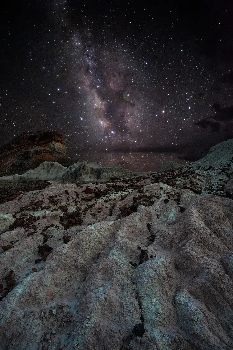 Milky Way over Cerro Castellan in Big Bend National Park, captured during a photography workshop using a time-compressed image technique, blending twilight foreground with starlit cliffs.