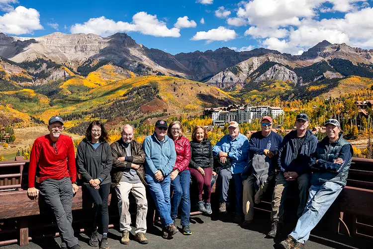 Workshop participants in Telluride, Colorado, with vibrant fall foliage and mountain backdrop.