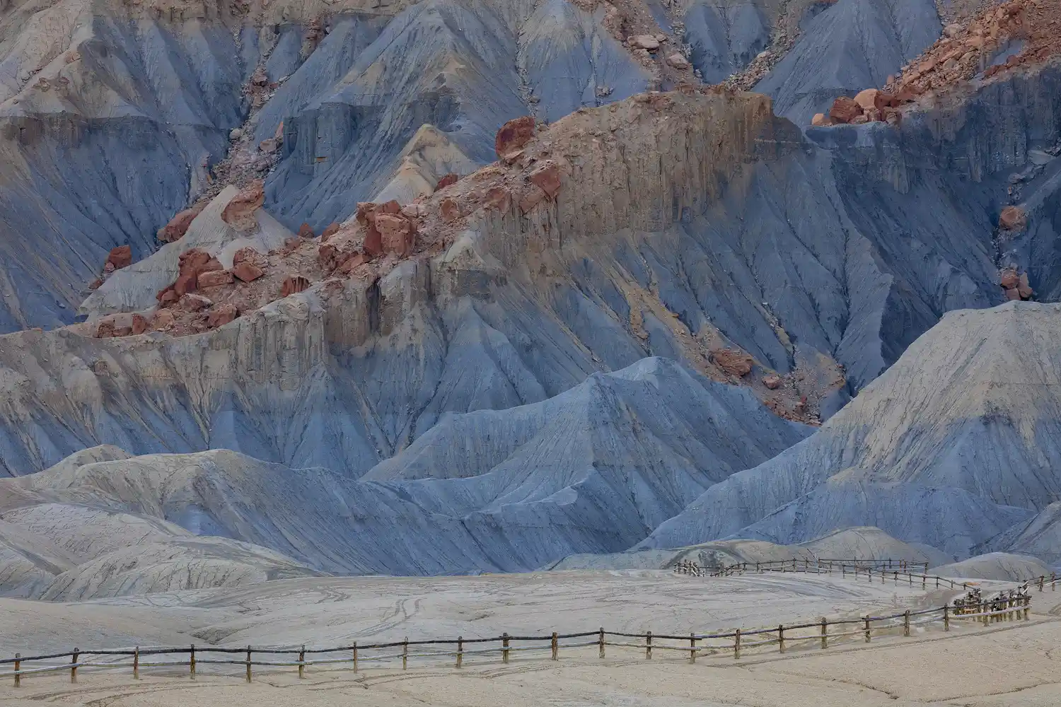 Softly lit layers on the shaded side of North Caineville Mesa, Utah.