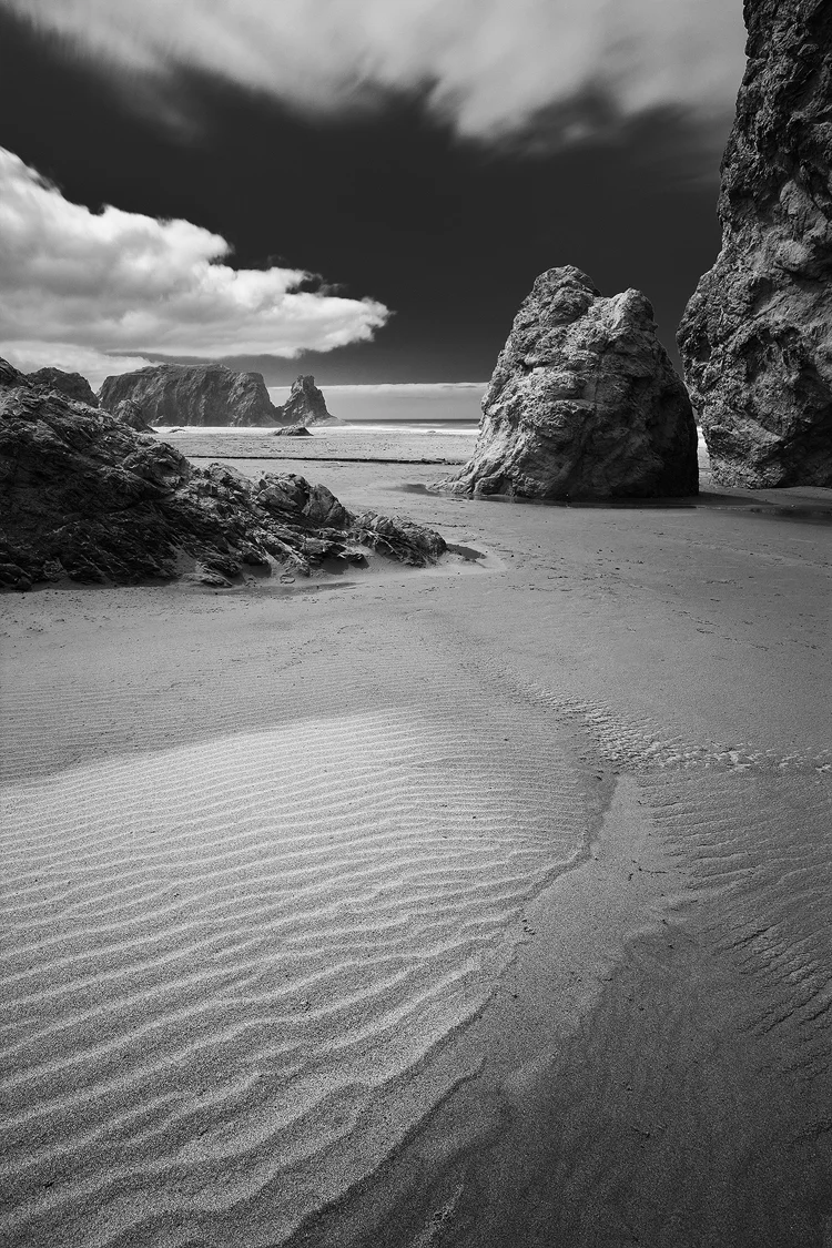 Black and white photo of sea stacks at Bandon Beach, Oregon.
