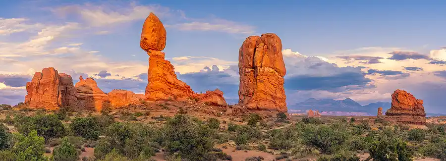 Balanced Rock glowing in evening light at Arches National Park.