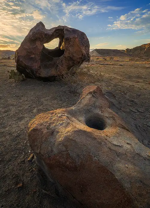 Donut-shaped volcanic boulder and grinding hole at Indian Head in Big Bend National Park.