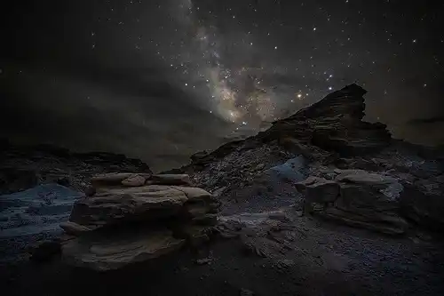 Milky Way, boulders, ridge, Big Bend National Park. Night sky photo by Dale Sullivan.